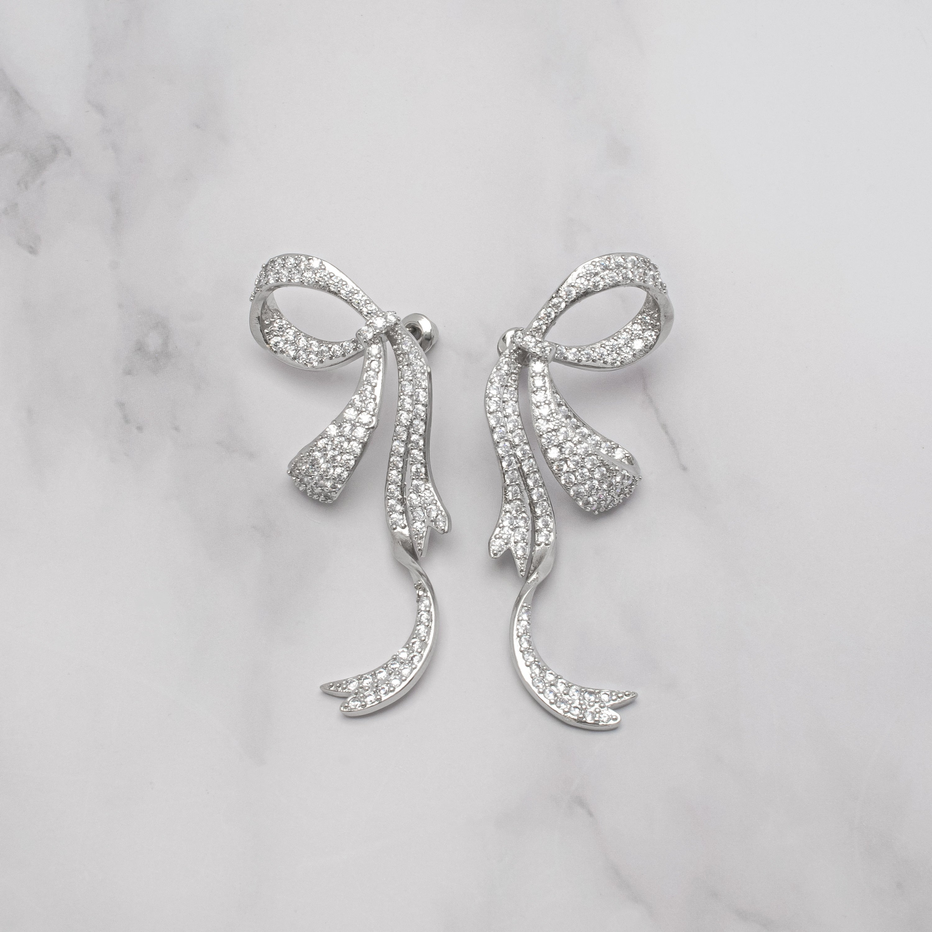 Silver Plated Cubic Zirconia Side Bow Earrings